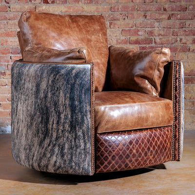 Front view of Cambridge Western recliner chair with leather and brindle cowhide