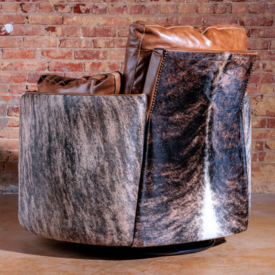 Back view of Western-style swivel recliner with cowhide paneling