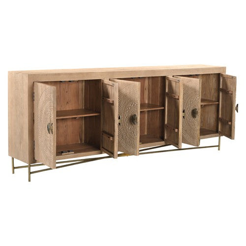 The Brooklyn 6 Door Natural Carved Sideboard combines hand carved doors and gold metal accents with a natural wood finish. With ample storage space, this sideboard is both elegant and functional, making it the perfect addition to any home.