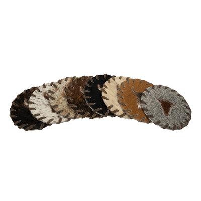 Round natural cowhide coasters. Assorted Colors. Price is PER COASTER - NOT A SET. This set of naturally absorbent leather coasters are Natural shed-free hair on cowhide which prevents drink from sticking, and shows no discoloration when wet. These are made from premium hair-on leather.