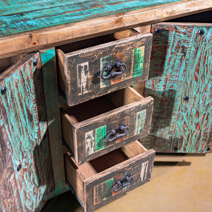 Drawer detail of Calavera Ranch Buffet with distressed wood and turquoise patina finish