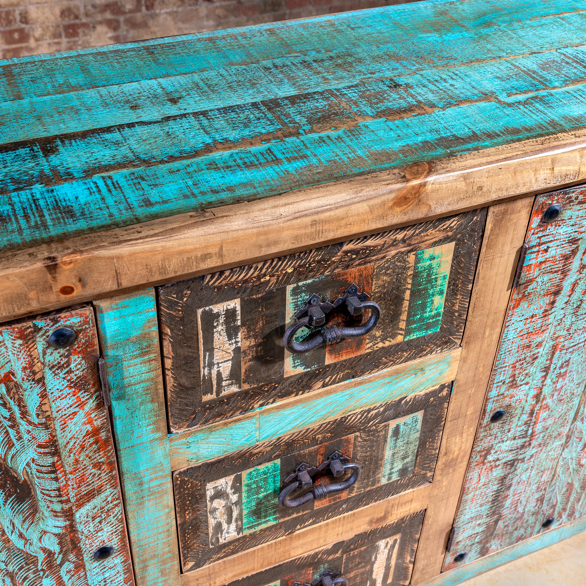 Close-up of Calavera Ranch Buffet top showcasing aged turquoise patina reclaimed wood texture