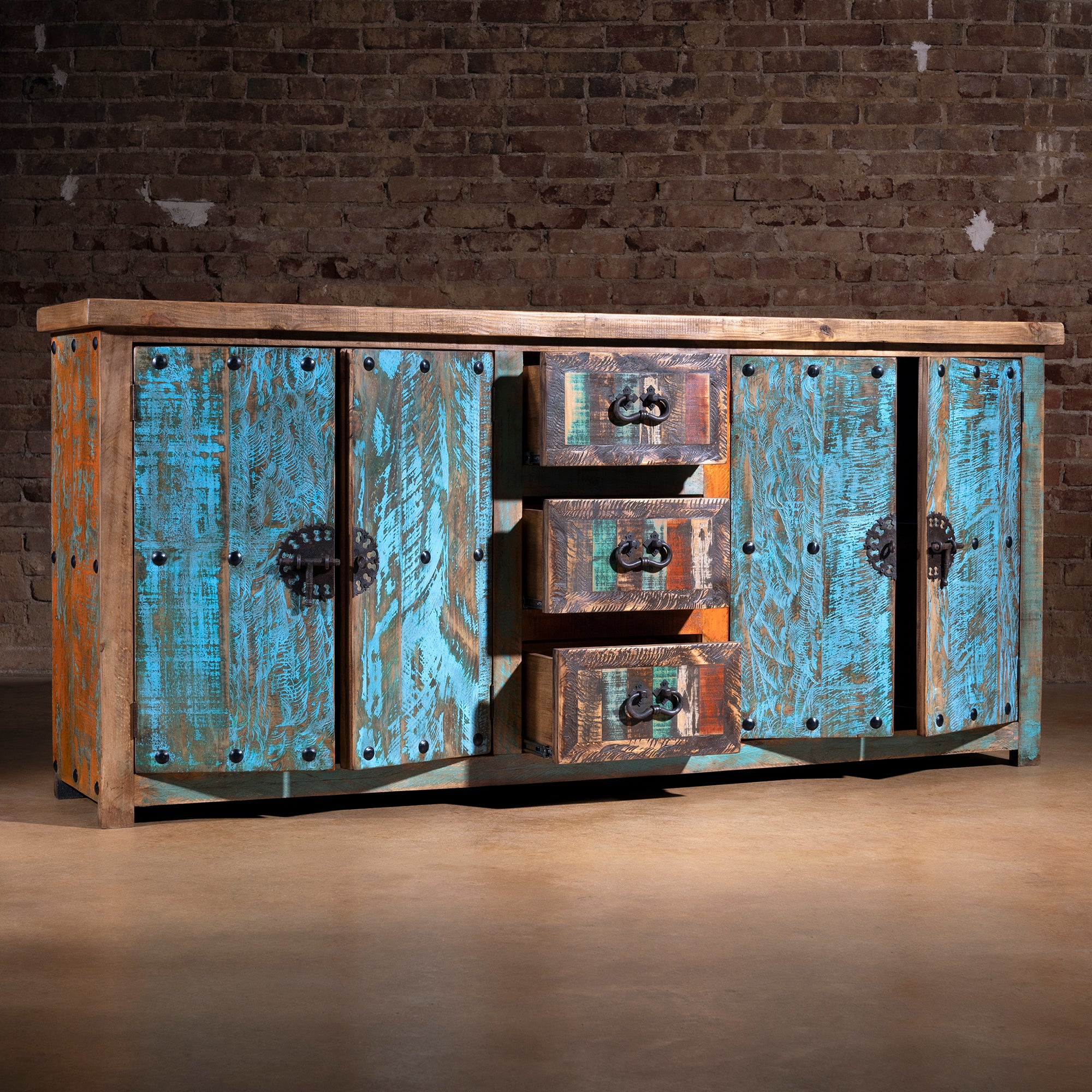 Front straight-on view of Canyoncrest Patina Buffet with reclaimed multicolor doors and drawers