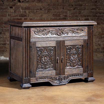 Hand-carved Western nightstand with rosette doors, antique dark wood finish, and forged iron pulls