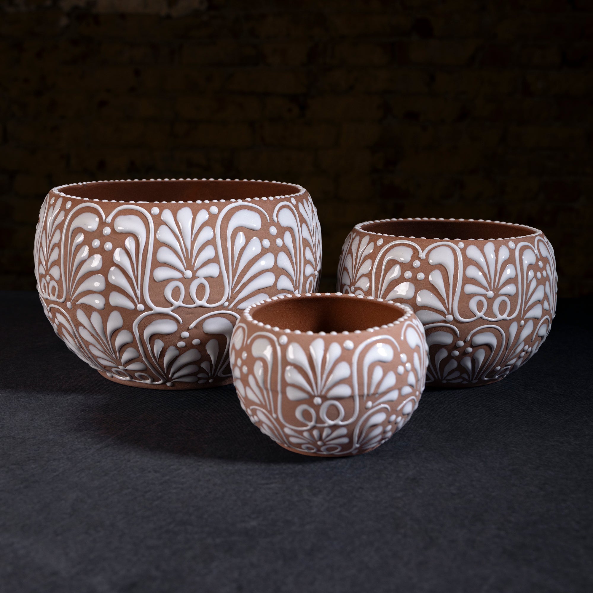 Casa Blanca Terracotta Vase Set – handcrafted Western pottery with white embossed patterns