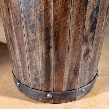 Close-up of reclaimed wood staves and riveted dark metal band on barrel accent table