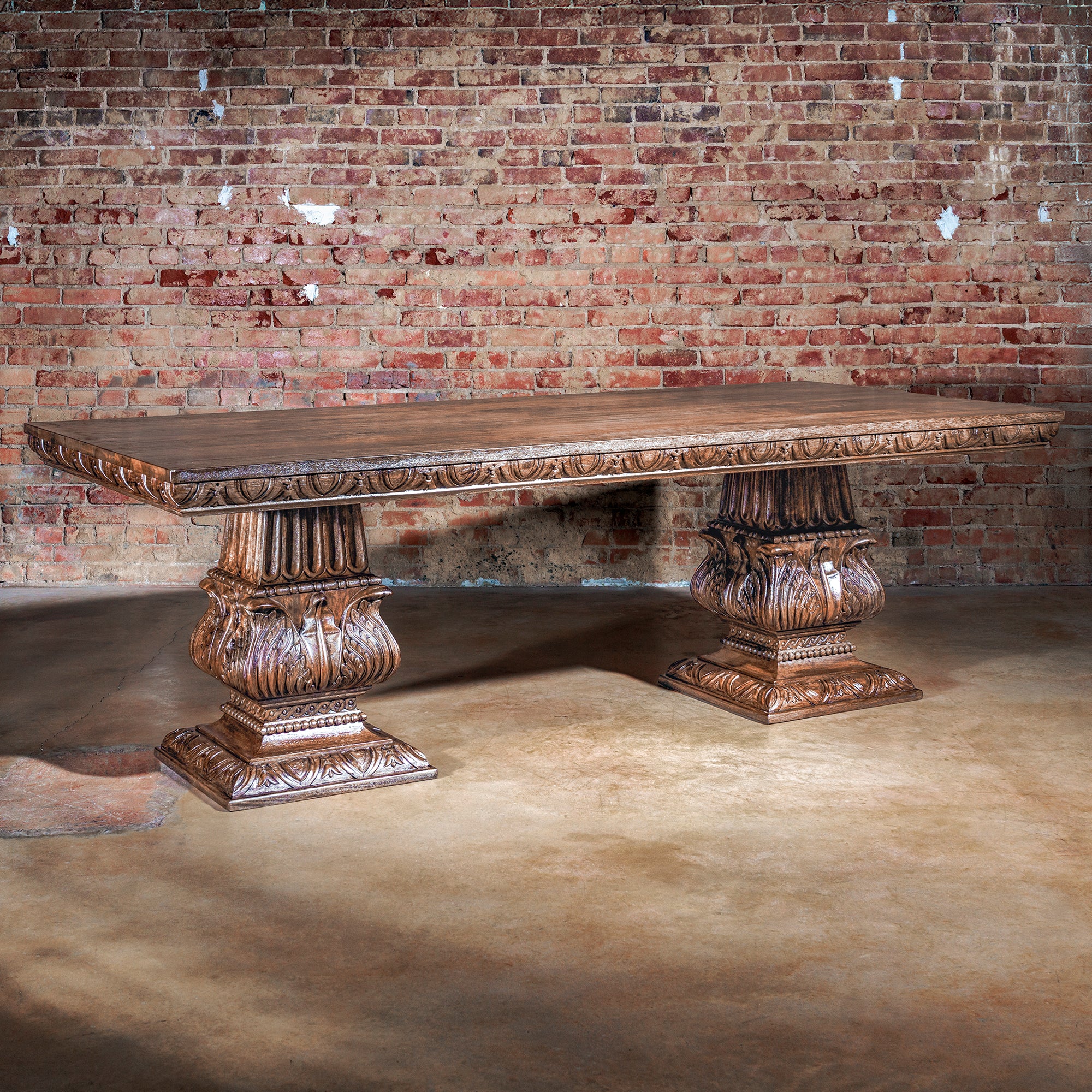 The Castilian Pedestal Dining Table in handcrafted Western hardwood with ornate double pedestal base