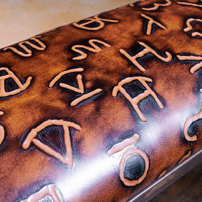 Solid wood bench with stamped top-grain leather and lower shelf