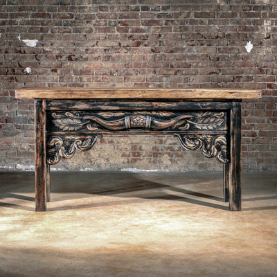 Front view of the Cattleman’s Crest Console showcasing ornate longhorn carving and heirloom-quality craftsmanship.