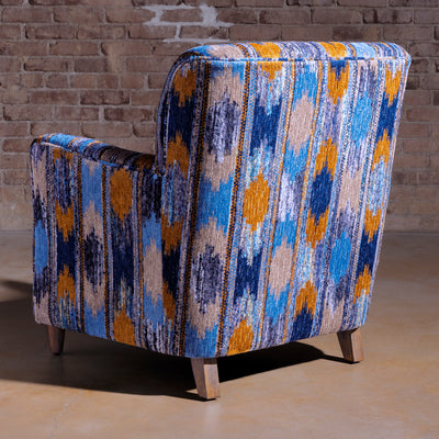 Back view showing full-wrap patterned fabric on Cerulean Chimayo accent chair