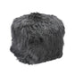 This Tibetan Lamb Pouf is a luxurious, solid wood cube wrapped in plush foam and soft tibetan lamb, perfect for extra seating in a living room or as a vanity stool. Its versatility makes it a great addition to any home. It can also be used as an ottoman!