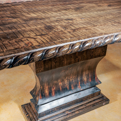 Close-up of textured wood tabletop with rope edge detail