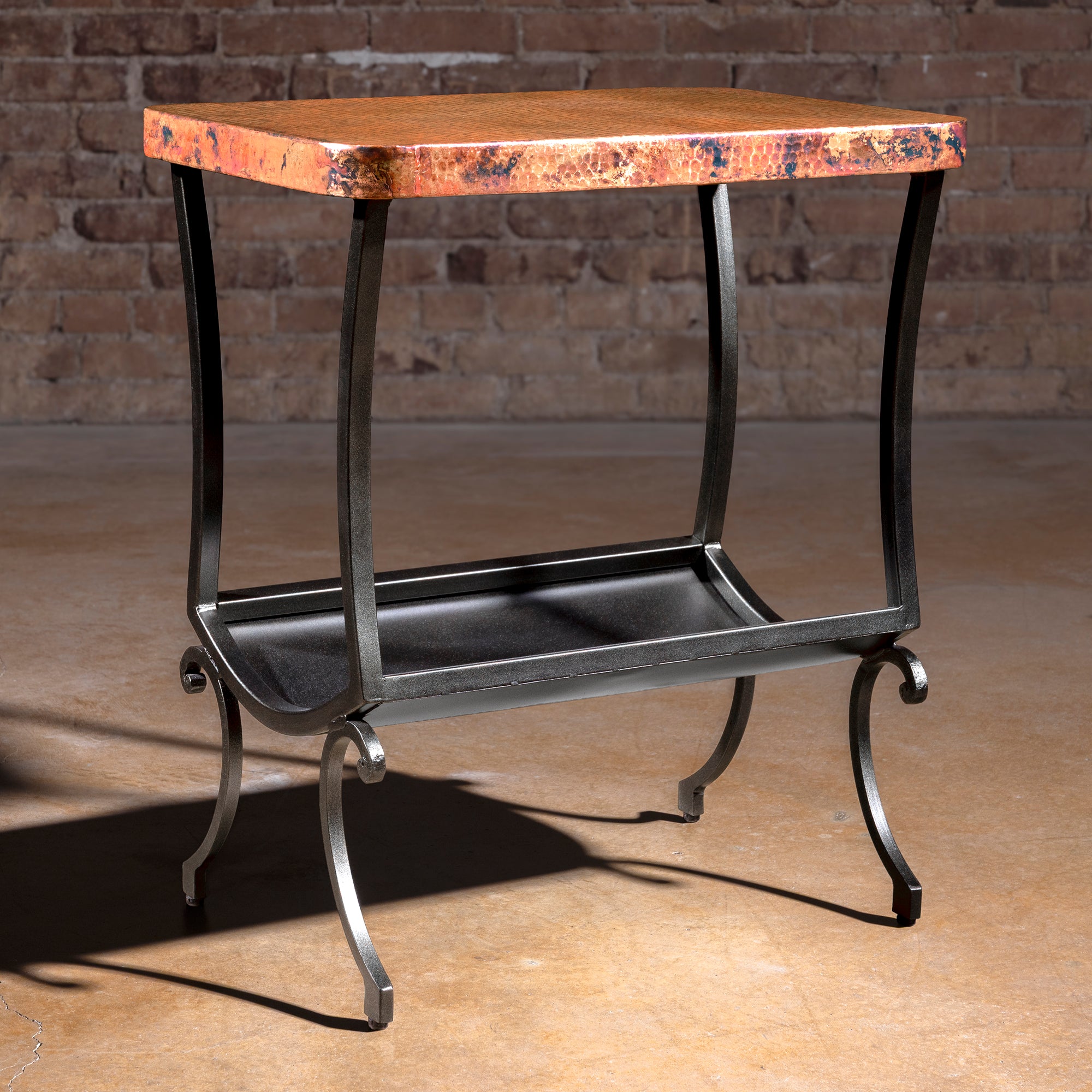 Cobre Scroll Table hammered copper wrought iron accent table with black scroll base and lower magazine holder shelf