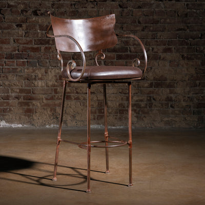 Western bar stool with copper-toned metal backrest, forged iron frame, and dark leather seat