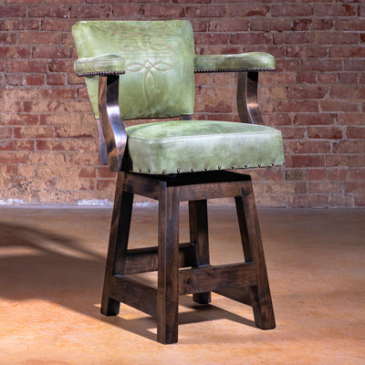 Luxury Western bar stool in sage-green leather with boot-stitch embroidery and axis hide back—Coronado