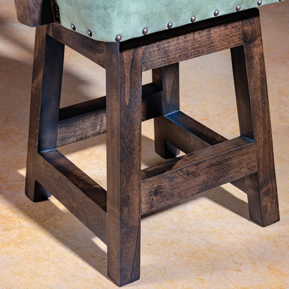 Solid alder wood frame and base detail of Coronado Axis Western bar stool