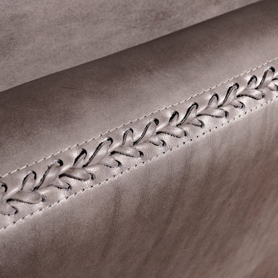 Close-up of whipstitch detail on Cortez Leather Chair
