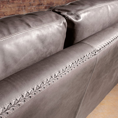 Back cushion and whipstitch trim detail on the Cortez Leather Sofa