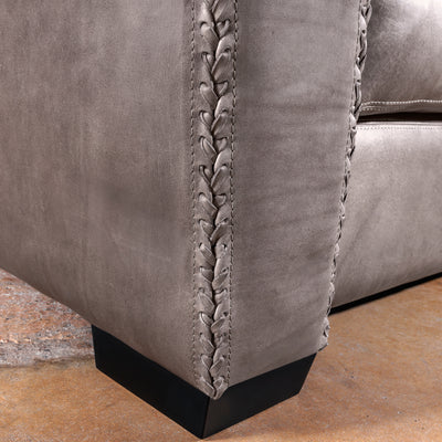 Lower arm whipstitch leather detail on the Cortez Sofa