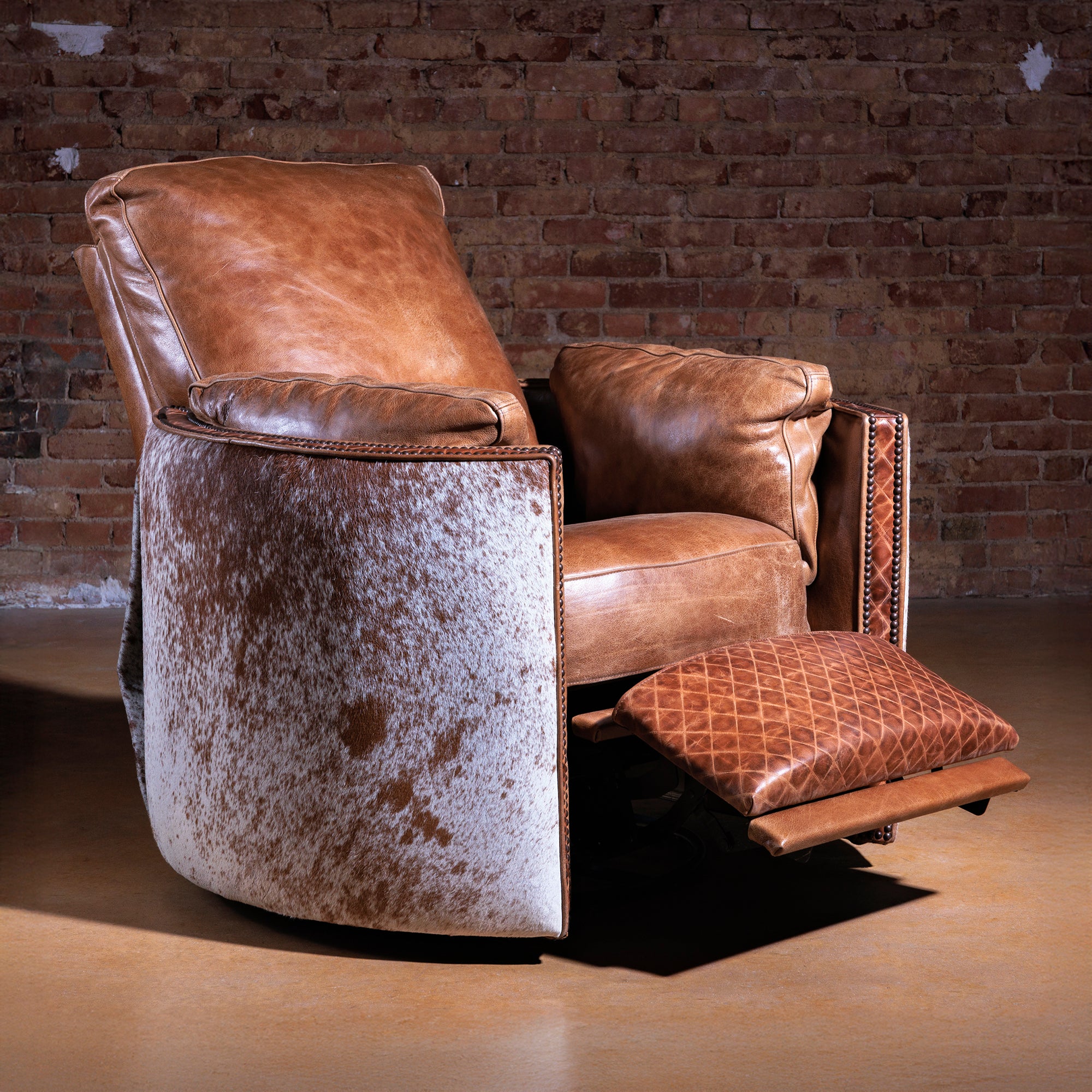 Luxury Western cowhide cuddler recliner with 360 swivel