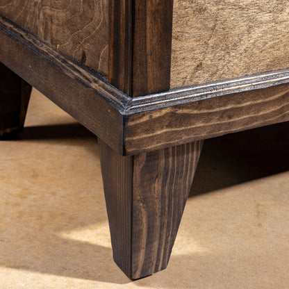 Handcrafted hardwood leg and trim detail on Cattleman’s Hide Storage Bench