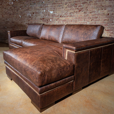 Top-grain leather Western sectional with chaise lounge in rich distressed finish and wide armrests