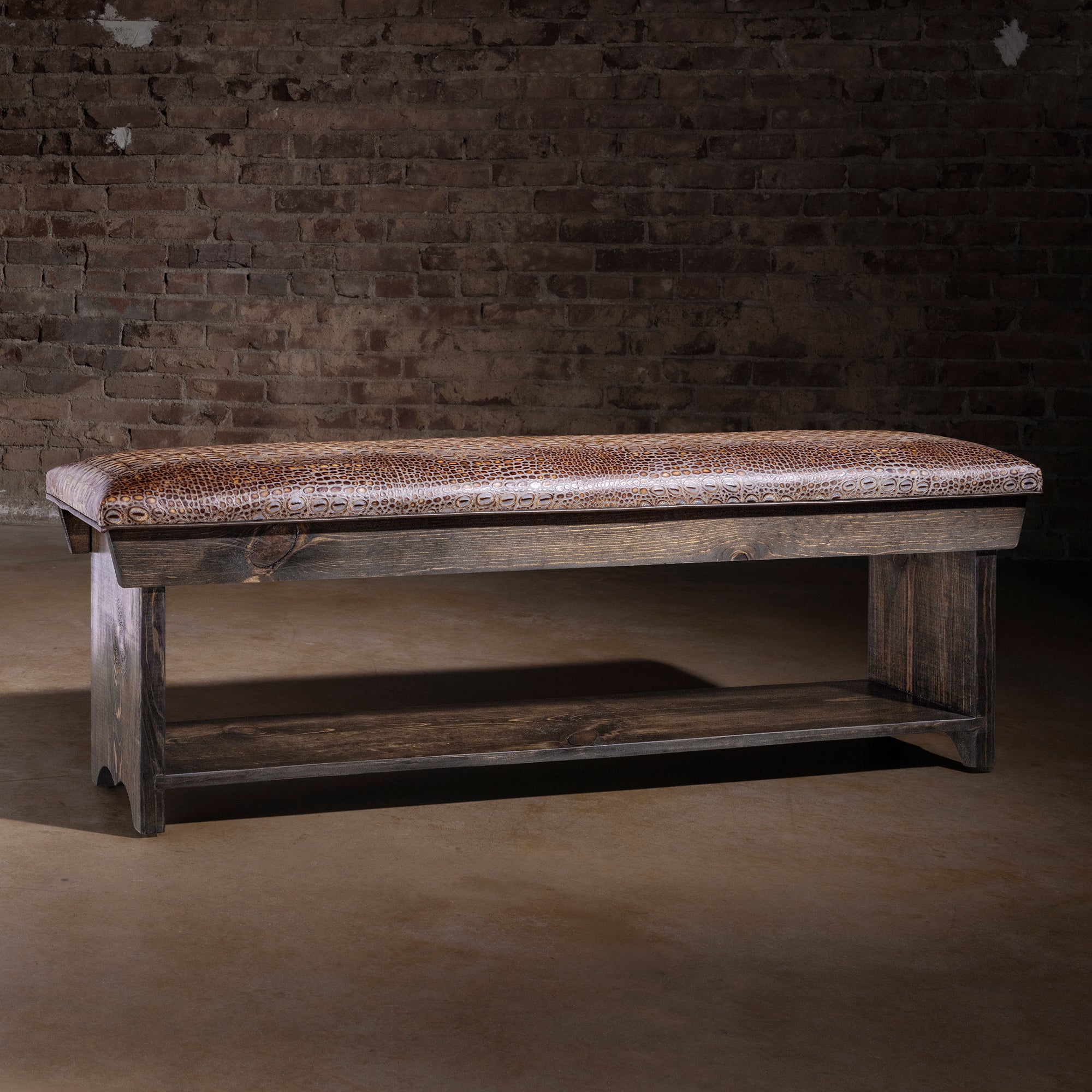 Estancia Regent Embossed Leather Western Bench western bench with dark wood frame, croc-embossed top grain leather seat, and lower shelf