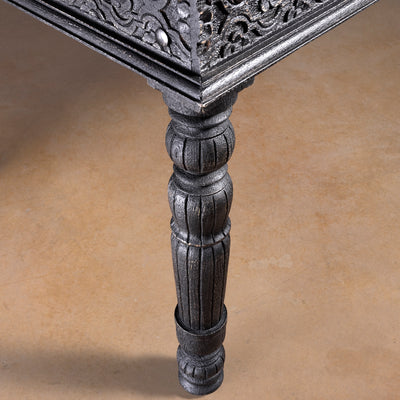 Fortville Carved Dining Table western hand carved dining table leg detail with turned mango wood base and dark distressed finish