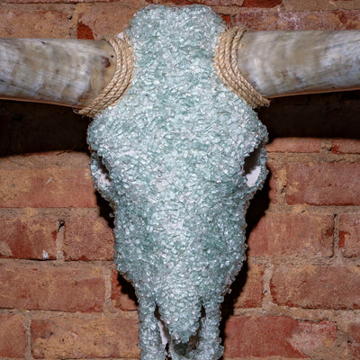 Close-up of icy glass texture and horn detail on Western skull wall décor