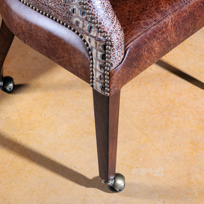 The Gambler’s Mark Western Poker Chair in embossed top-grain croc leather leg detail