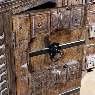 Spanish mission-style carved door detail with iron ring pull on the Hacienda Ironwood Buffet