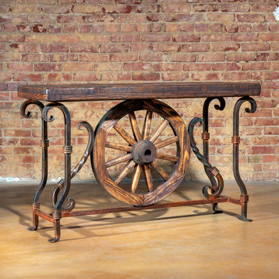 Side view of handcrafted wagon wheel console table