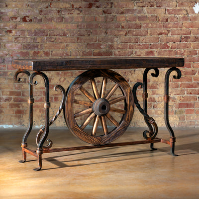 Side view of handcrafted wagon wheel console table