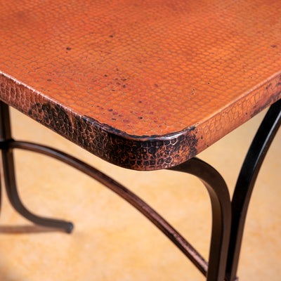hammered copper and wrought iron accent table