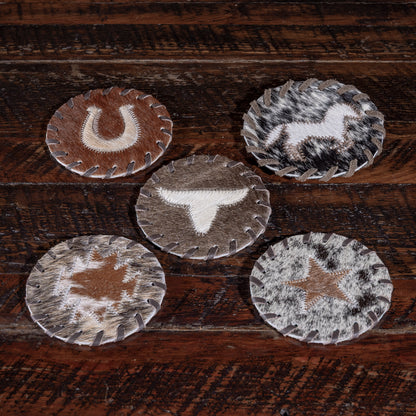 Hand-stitched cowhide coasters with leather lacing — Western table accent.