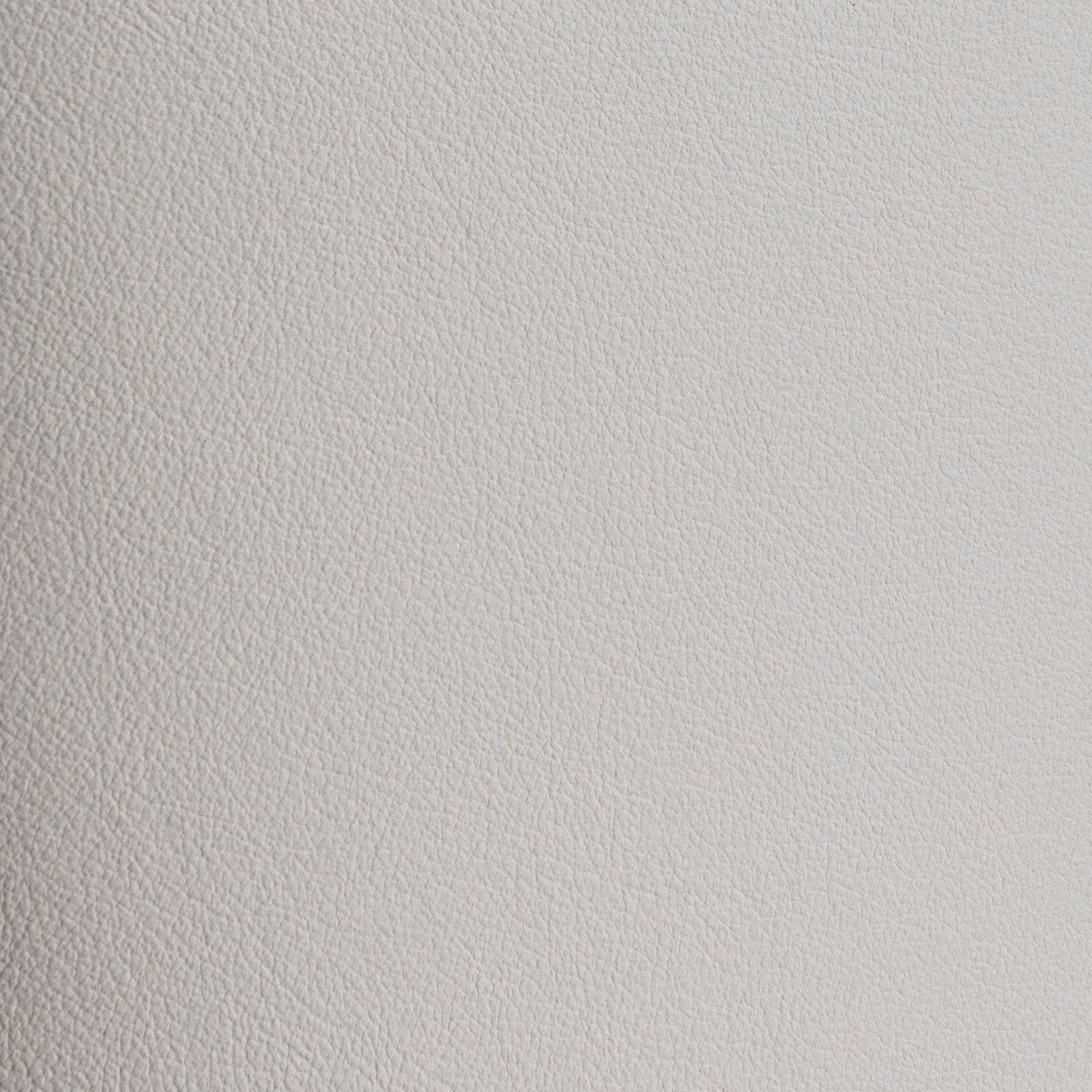 Closeup of ivory leather texture on High Plains Ivory Western dining chair