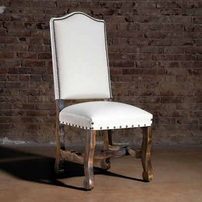 High Plains Ivory Western leather dining chair in rustic brick loft setting