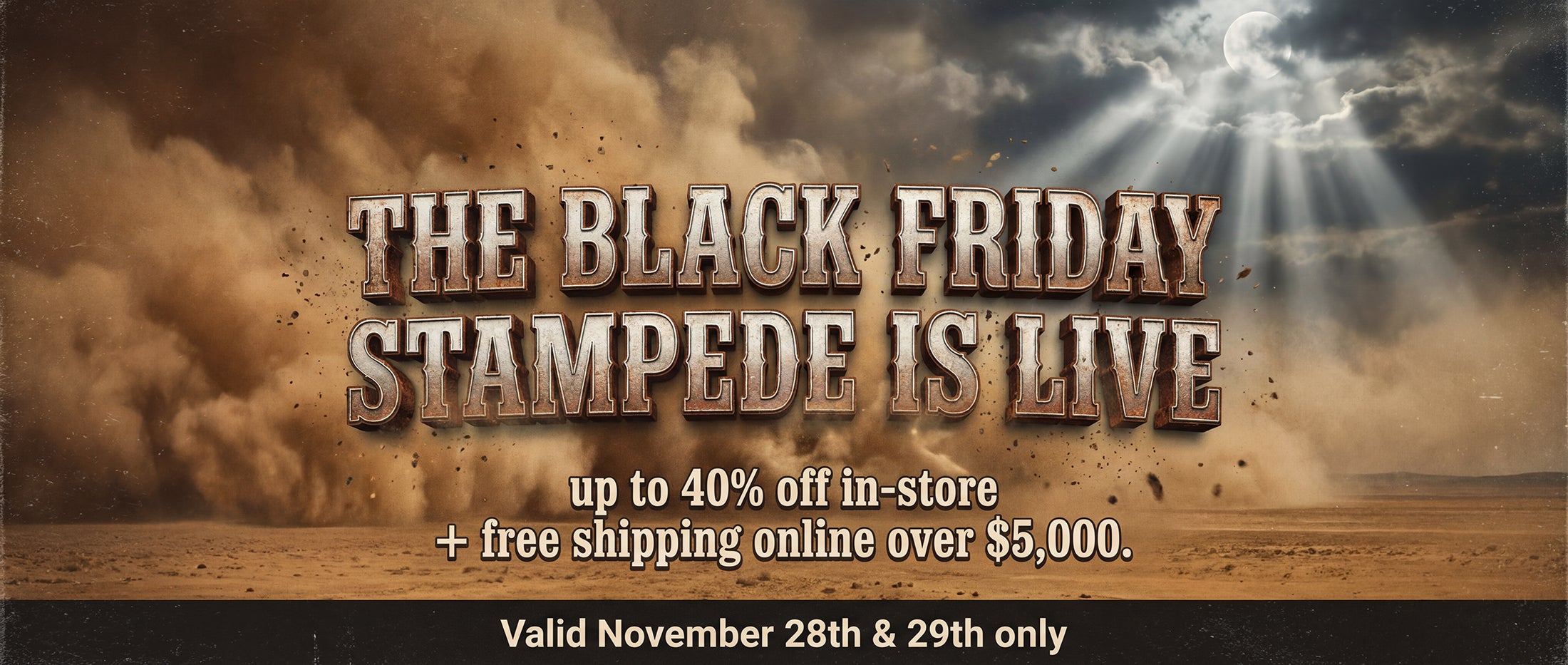 Black Friday hero banner for Into The West showing a luxury Western leather sofa and hammered copper table with the headline ‘The Black Friday Stampede’ and text promoting up to 40% off in-store and free shipping online over $5,000.