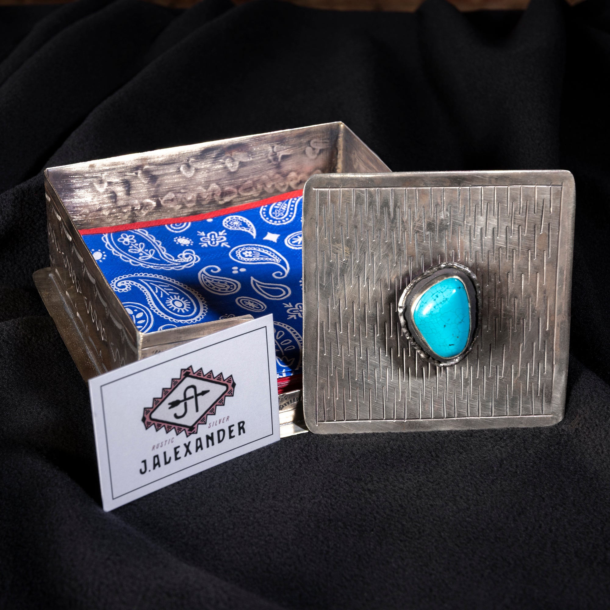 J. Alexander Blue River Napkin Caddy shown with turquoise top and artisan silver craftsmanship