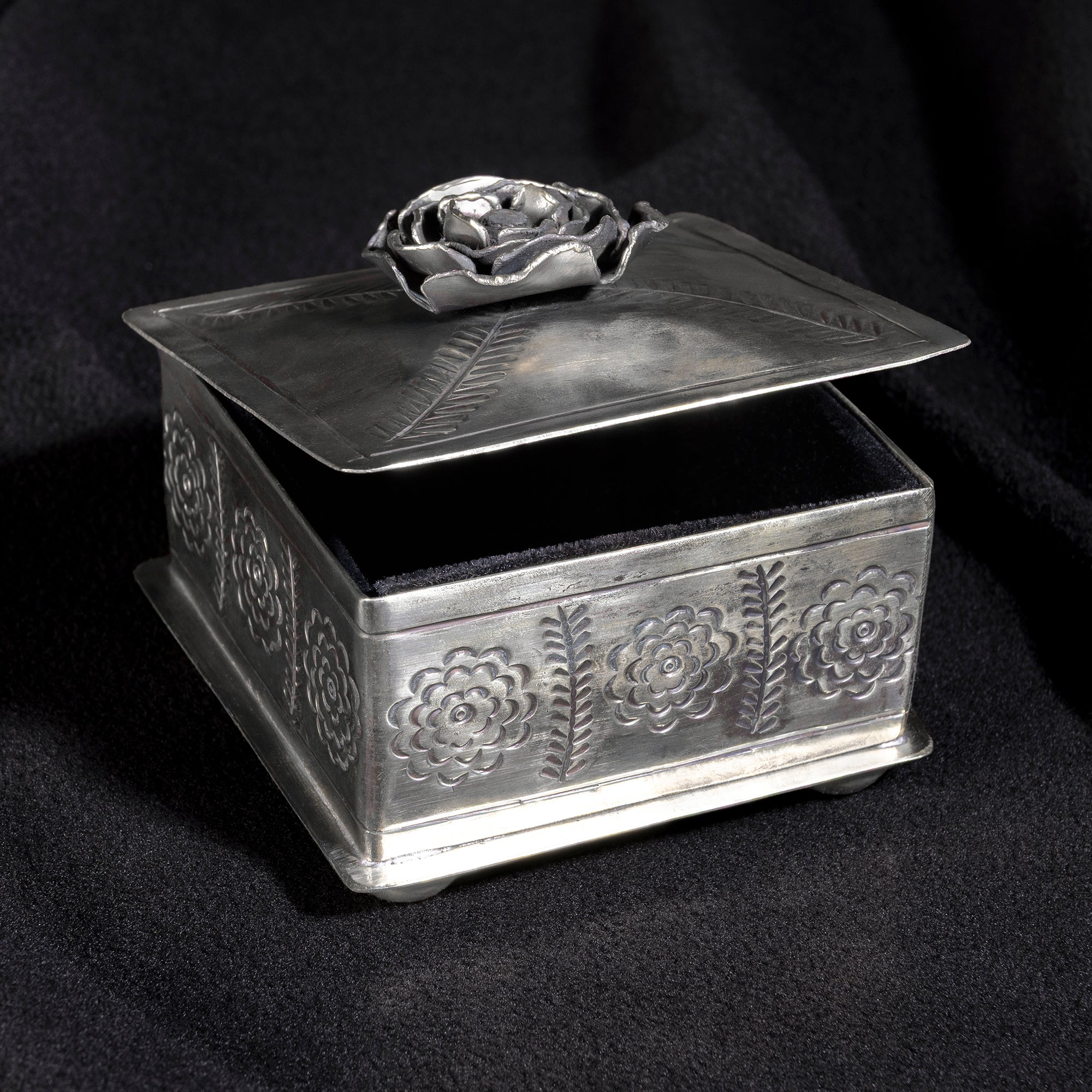 Open Desert Rose Keepsake Box by J. Alexander showing hand-tooled silver sides and detailed rose lid