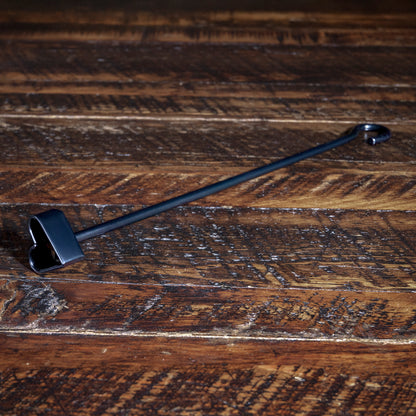 Western steak branding iron from Into The West — metal letter brand for cowboy grilling or ranch décor.
