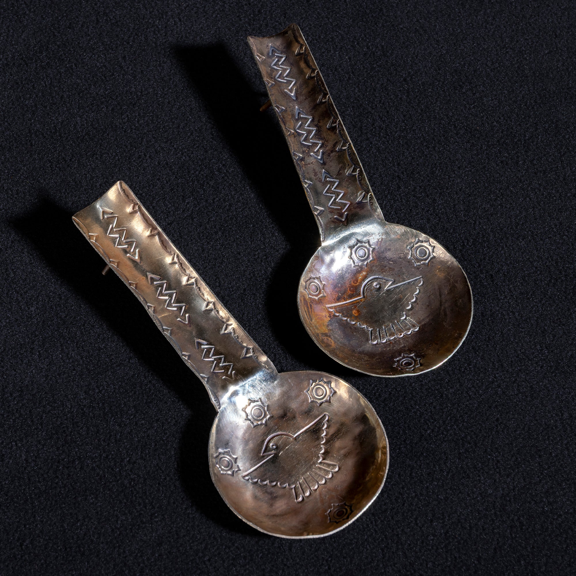 Hand-stamped German silver cigar rest by J. Alexander featuring Thunderbird design and Western lightning motifs