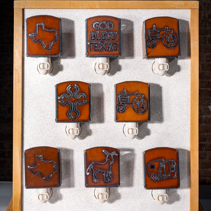 Western nightlight collection from Into The West — handcrafted designs featuring Texas, crosses, and longhorns.