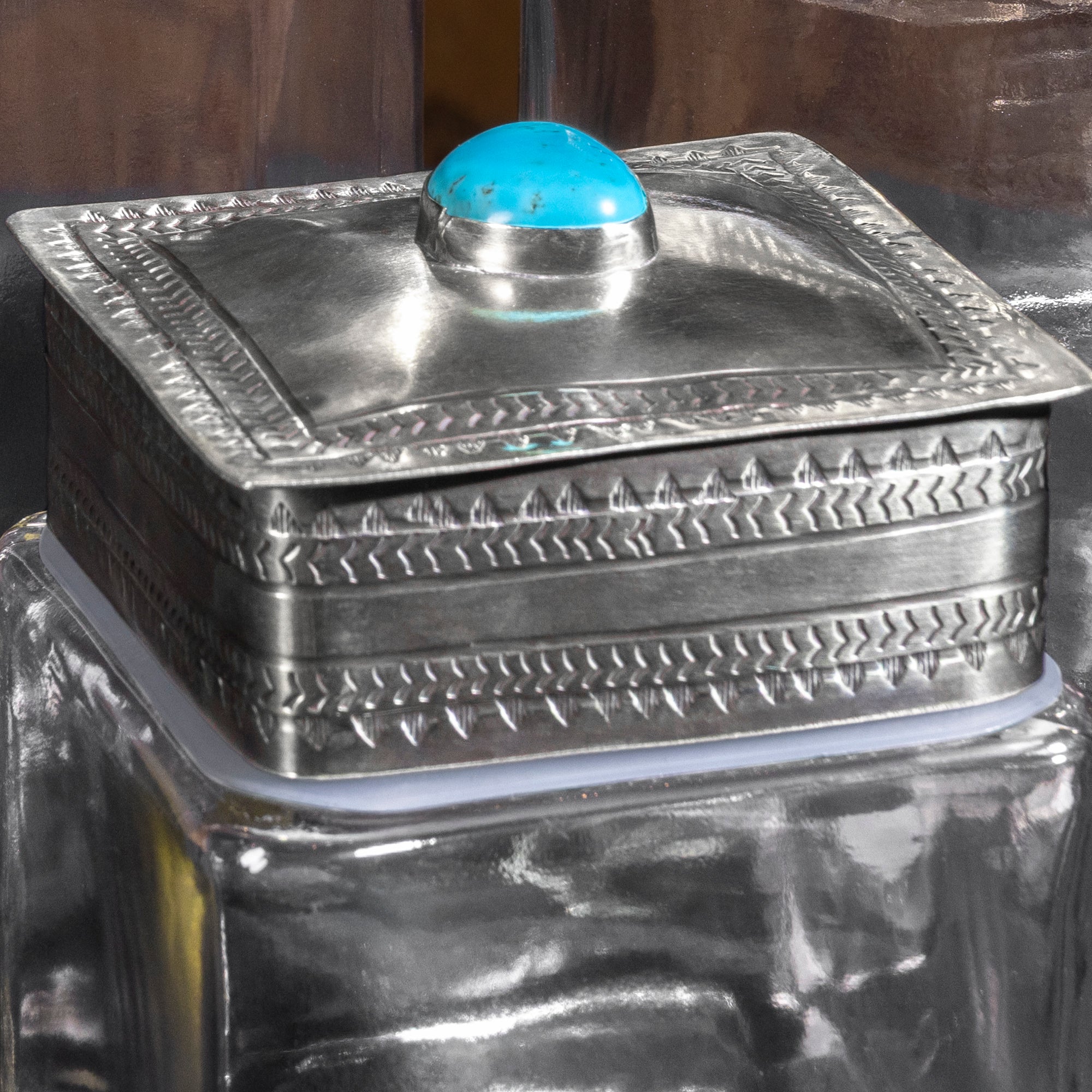 Top view of J. Alexander Sedona turquoise decanter set showing Western silver stampwork and turquoise tops