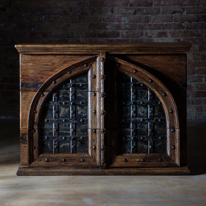 Hero view of the Cathedral Range Nightstand showing mango wood and iron arch design