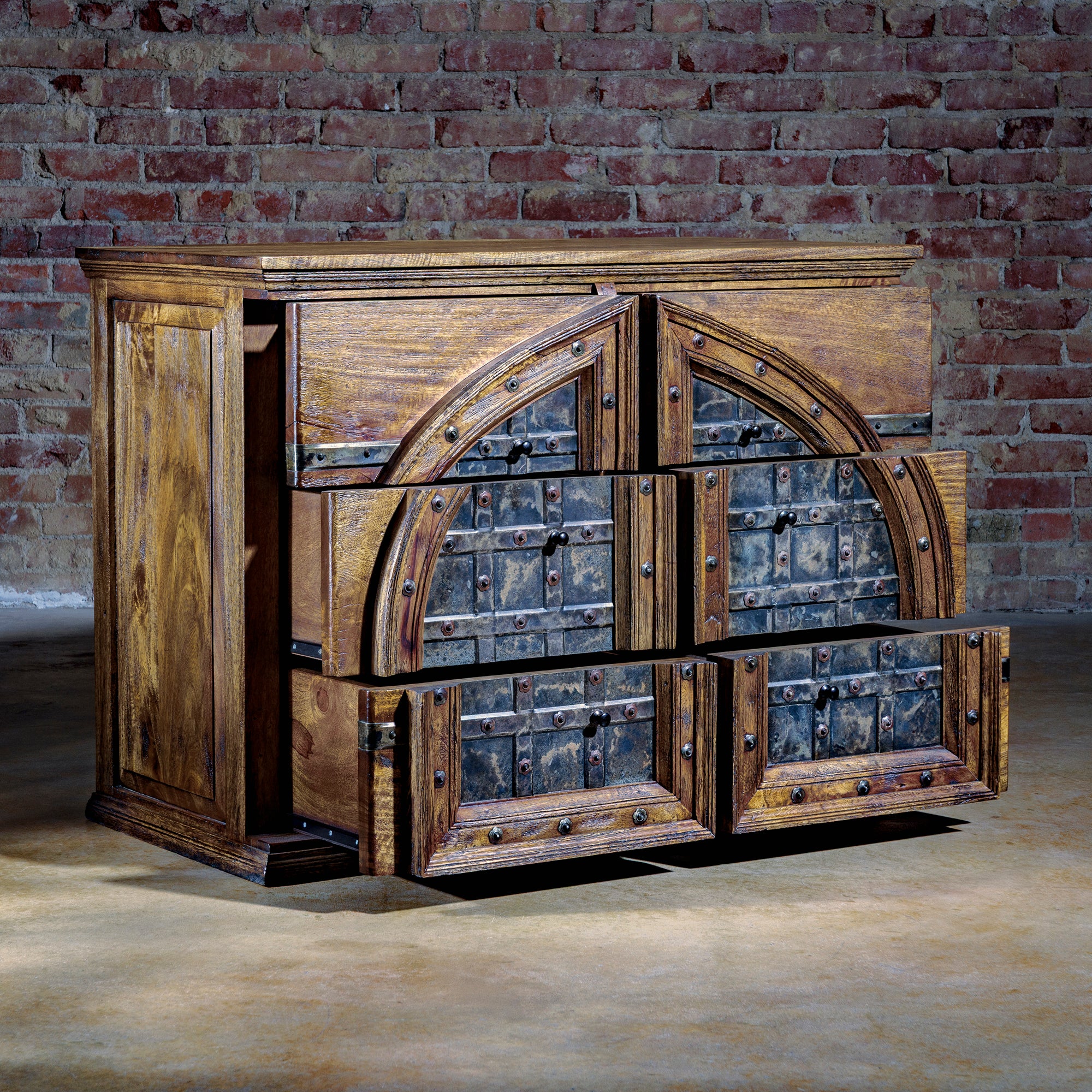 Drawers open on the iron door nightstand showing interior storage space