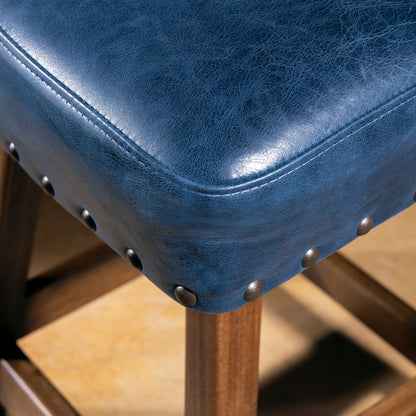Blue leather bar stool seat with antiqued nailhead trim and wood legs