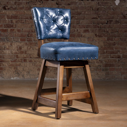 Blue leather Western bar stool with tufted back and wood base