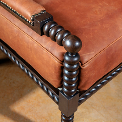 western-leather-seat-armrest-nailhead-detail