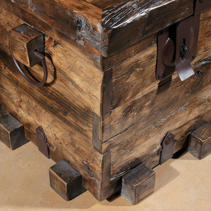 Base detail showing block feet on small Western reclaimed wood trunk table